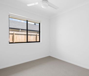 Modern Family Home in Logan Reserve - Photo 3