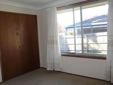 Tidy Two-Bedroom Unit in Peaceful Location - Photo 5