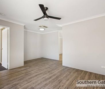 COSY FAMILY HOME IN CONVENIENT LOCATION - Photo 1