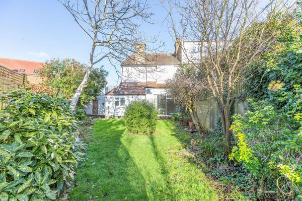 Newly refurbished two bedroom flat with private south facing garden in Barnes Village - Photo 1