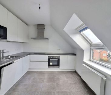 Duplex te huur in Braine-l'Alleud voor € 875 met 1 slaapkamer - Photo 1