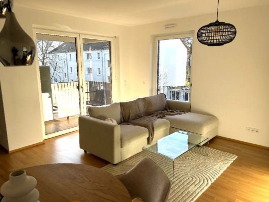 NEUE BAHNSTADT OPLADEN: Neuwertige 2-Zimmer-Wohnung mit Einbauküche und Loggia! - Photo 1