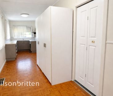 Prime Location 1 Bedroom Duplex with Spacious Yard! - Photo 1