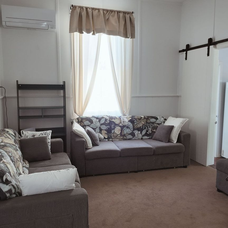 Fully Furnished 3 Bedroom Home - Photo 1