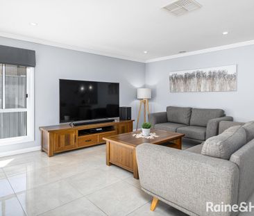 SPACIOUS FOUR-BEDROOM HOME - Photo 1