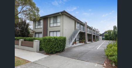 Updated upstairs 2 bedroom unit - Photo 4