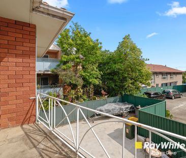 Bright 1-Bedroom Unit with Private Balcony - Photo 2