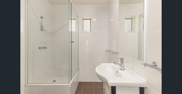 Stylish Secure Apartment in a Prime Lifestyle Location - Photo 1