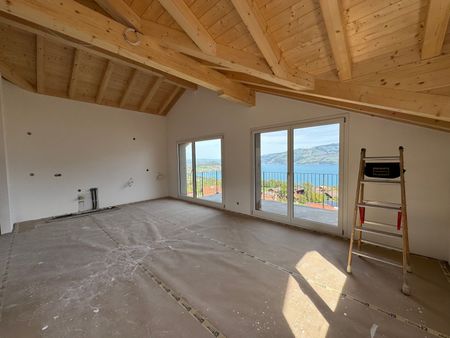Herrliche Sicht auf den Thunersee, Grosszügige Terrasse (ca. 30 m²), Erstbezug im Neubau mit vier Einheiten - Photo 5