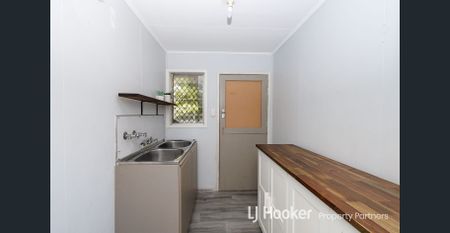 Family-Friendly Comfort with Large Backyard & Renovated Interiors - Photo 3