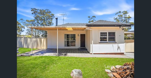 Charming Family Home with Spacious Backyard! - Photo 1