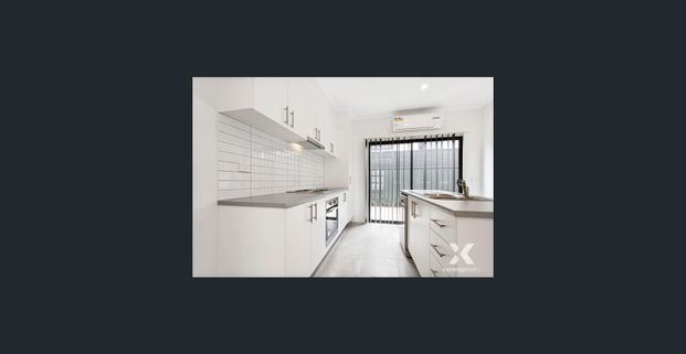 Modern Comfort in a Family-Friendly Neighbourhood - Photo 1