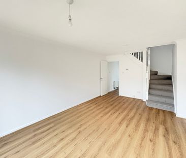 This two double bedroom mid-terrace property, is ideally located in... - Photo 1