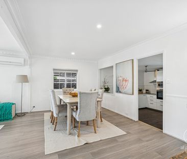 Warm, Welcoming Home with Poolside Living & Flexible Extra Space - Photo 6