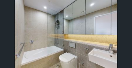 Stunning Two Bedroom Apartment with Lovely District Views - Photo 4