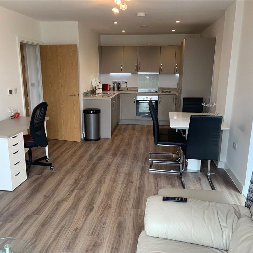 A third floor two bedroom, two bathroom apartment with lift access in the ever popular Bath Riverside development. Offered furnished and with the benefit of an underground parking space. - Photo 1