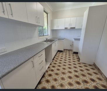 Neat & Tidy 3-Bedroom Home with Spacious Backyard! - Photo 5