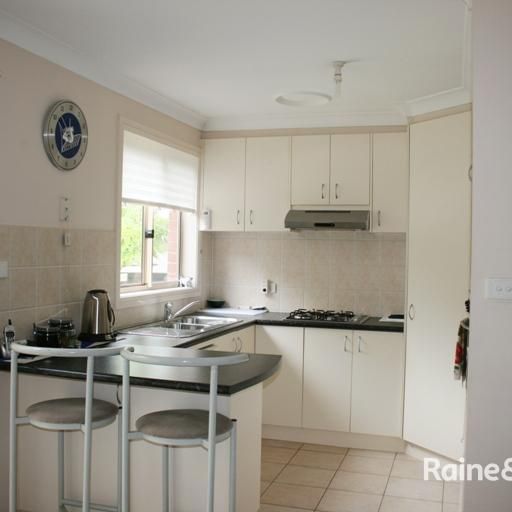 Conveniently Postioned Townhouse - Photo 1