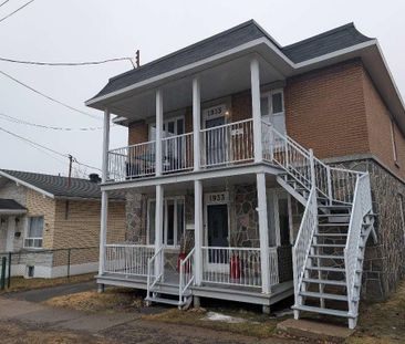 GRAND 6-1/2 A LOUER SPACIEUX ET LUMINEUX A SHAWINIGAN DISPONIBLE LE... - Photo 2