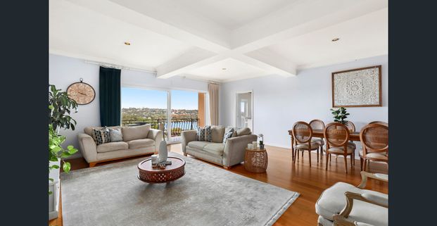 Elevated Elegance with Breathtaking Harbour-to-City Views - Photo 1