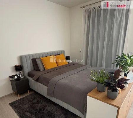 Krásný nový byt 1+kk v přízemí novostavby se zahrádkou a terasou - Fotografie 5