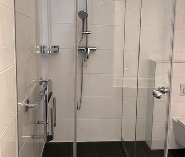 Moderne Neubauwohnung mit Loggia, Terrasse und Garten – inkl. TG-St... - Foto 4