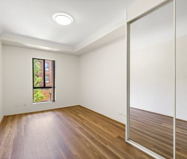 Spacious Two-Bedroom Apartment with Oversized Lock-Up Garage - Photo 2