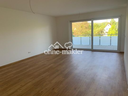 Lichtdurchflutete 4,5 Zimmer Wohnung mit Küche im Neubau - Foto 1