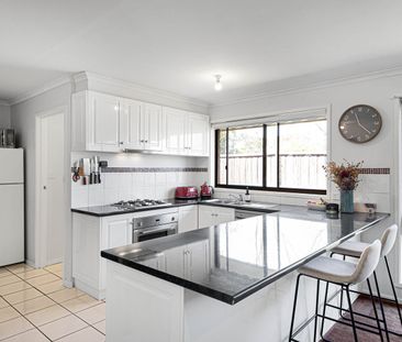 Refreshed Two-Bedroom Unit with Spacious Backyard - Photo 6
