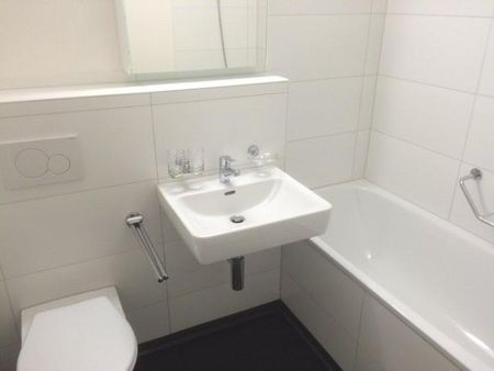 Moderne Dachwohnung nahe dem Stadtzentrum - Foto 5