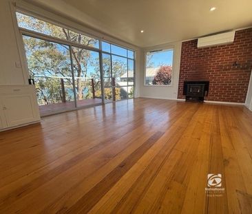 FRESHLY RENOVATED ON THE LAKES EDGE! - Photo 2