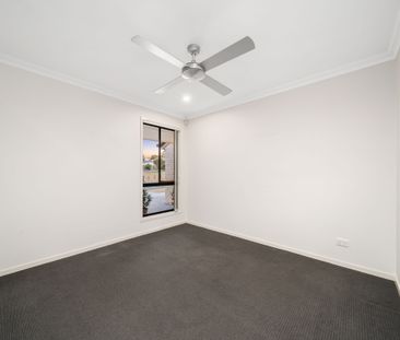 MODERN HOME WITH MULTIPLE LIVING AREAS + SOLAR - Photo 6