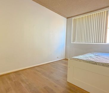 UNIT WITHIN WALKING TO TRAIN - FREE WATER - FURNISHED - Photo 3