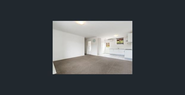 Neat & Spacious 2-Bedroom Unit in Prime Location - Photo 1
