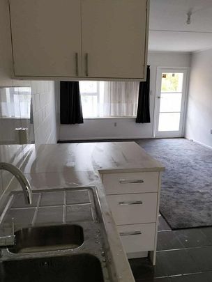 Charming 2BR Unit with Garden! - Photo 1