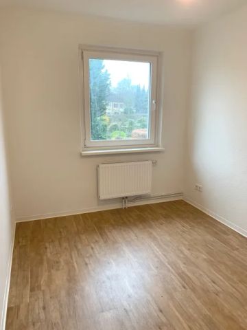 Modernisierte Erdgeschosswohnung mit eigenem Gartenanteil - Photo 4