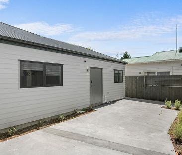 Charming 2BR Unit - Photo 6