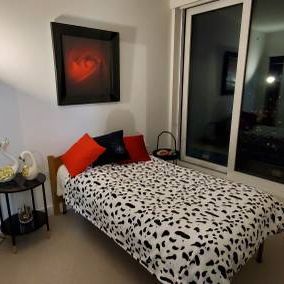 Private bedroom in a new Luxury Condo across from Joyce Skytrain Stn - Photo 1