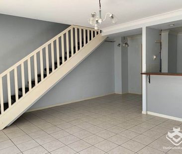 A LOVELY TOWNHOUSE IN A POPULAR BAYSIDE COMPLEX! - Photo 3