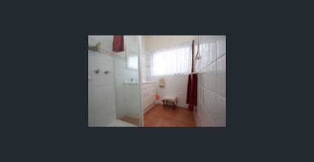 Charming Family Home with Sunroom, Spacious Yard & Garage - Photo 2