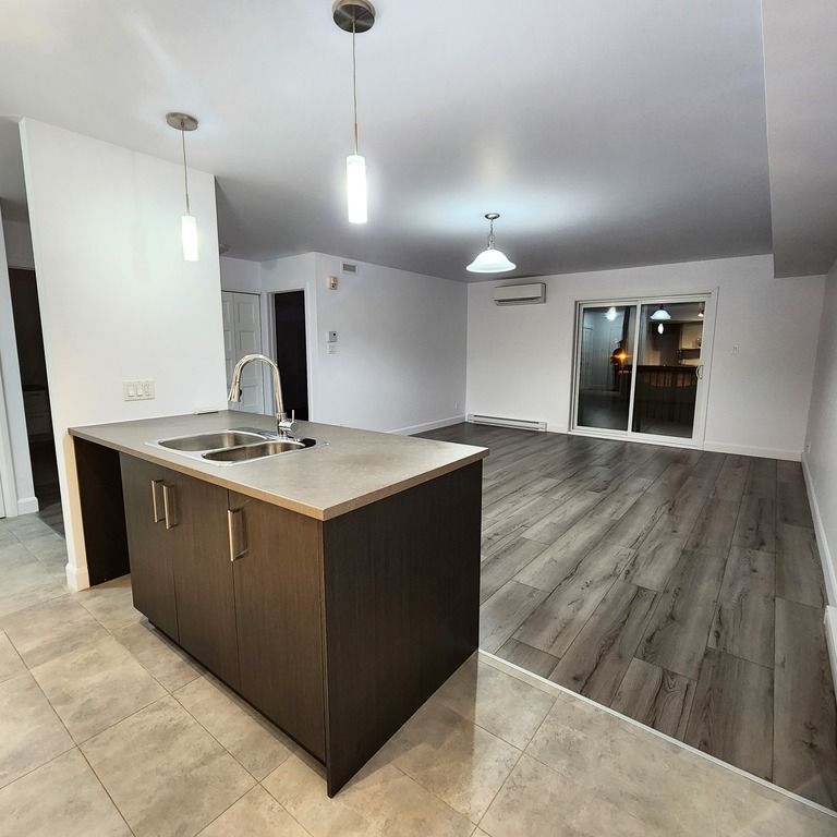 **APPARTEMENT**3 ½ **Boul. Bastien - Photo 1