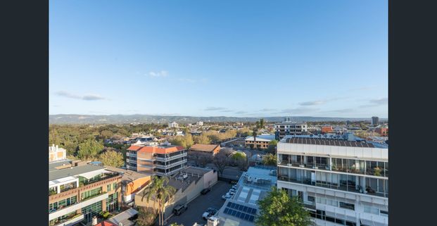 Fully Furnished East End Apartment | 2 Bed 2 Bath 1 Car | City Views - Photo 1
