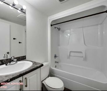 GREAT 2 BED, 1 BATH APARTMENT WITH OUTDOOR PARKING STALL IN THE COM... - Photo 2