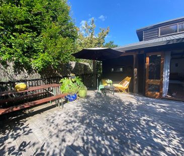 Charming 2BR Home with Lush Garden - Photo 6