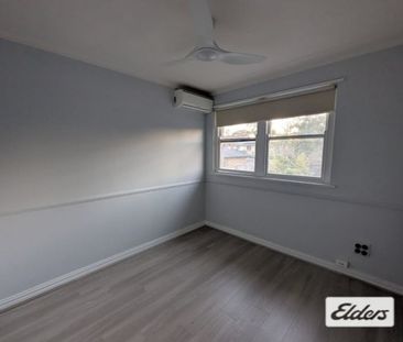 Spacious 2-Bedroom Duplex in Convenient Location - Photo 3