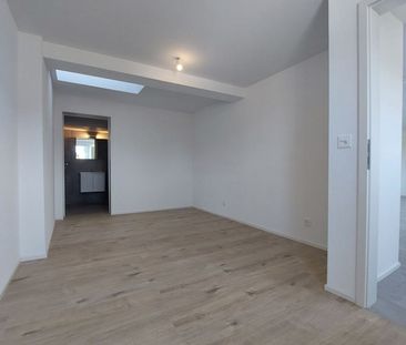 Appartement de 2,5 pièces au 2ème étage avec jardin commun - Photo 1