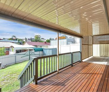 Conveniently Located Home with Modern Amenities and Spacious Yard! - Photo 6