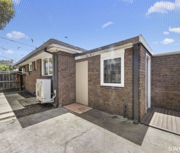 Conveniently positioned modern two bedroom unit with lock up garage - Photo 3