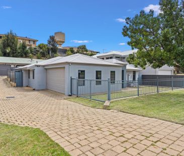 Relaxed Coastal Living in a Sought-After Location - Photo 1