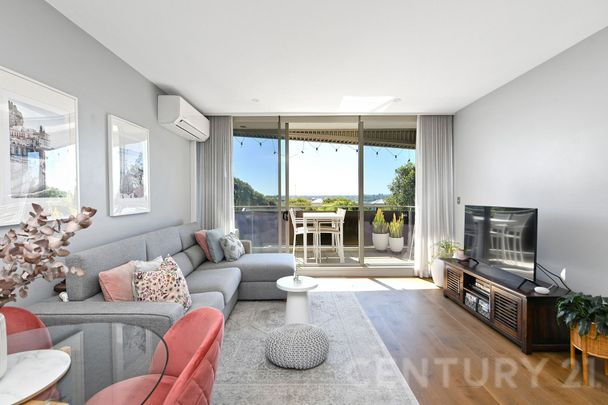 Elevated Luxury with Soaring Ceilings & Water Views - Photo 1